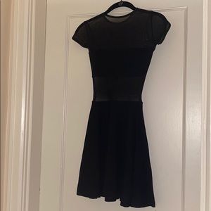 Black dress with mesh panels